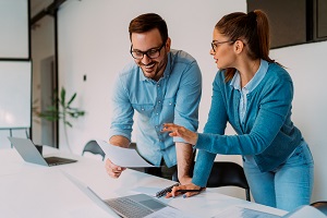 two business people working together